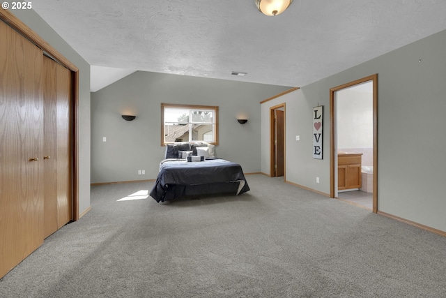 bedroom with light carpet, a textured ceiling, baseboards, vaulted ceiling, and visible vents
