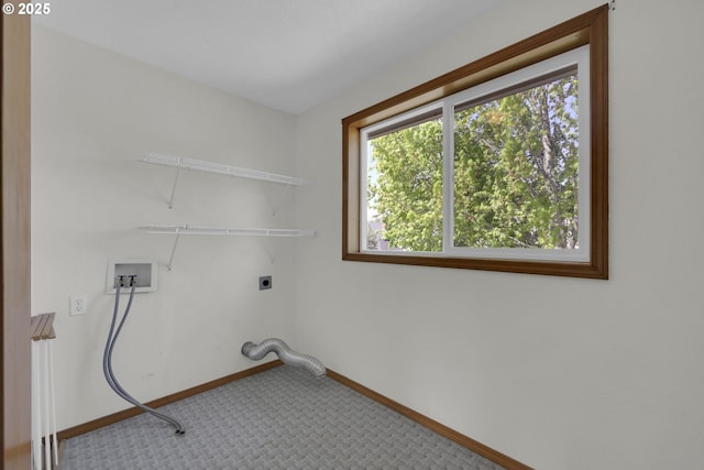 laundry area featuring washer hookup, hookup for an electric dryer, laundry area, baseboards, and carpet flooring