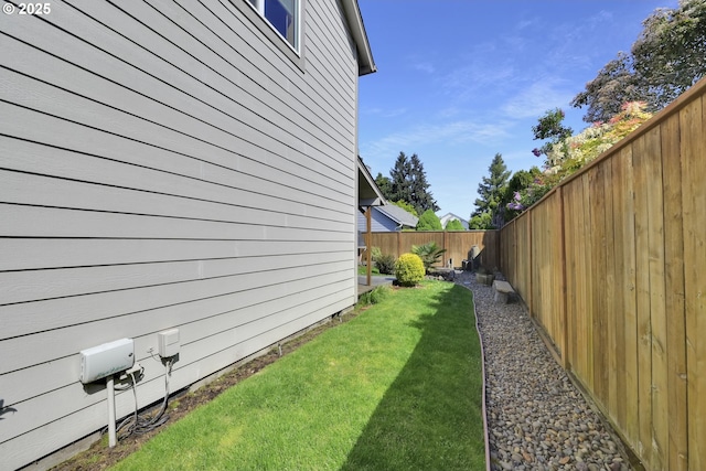 view of yard featuring a fenced backyard