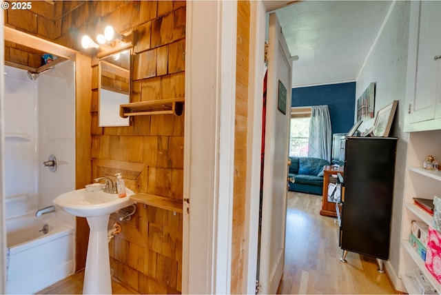 3265 SW 187th Ave, Beaverton, OR 97003 - bathroom featuring wood finished floors and shower / tub combination