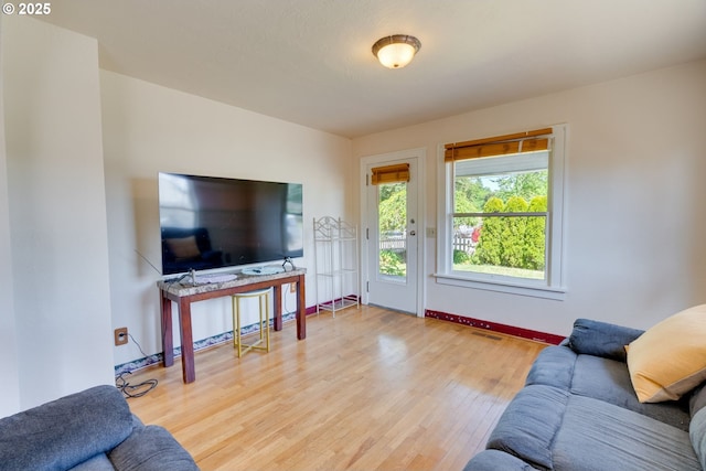 3265 SW 187th Ave, Beaverton, OR 97003 - living area with wood finished floors and baseboards