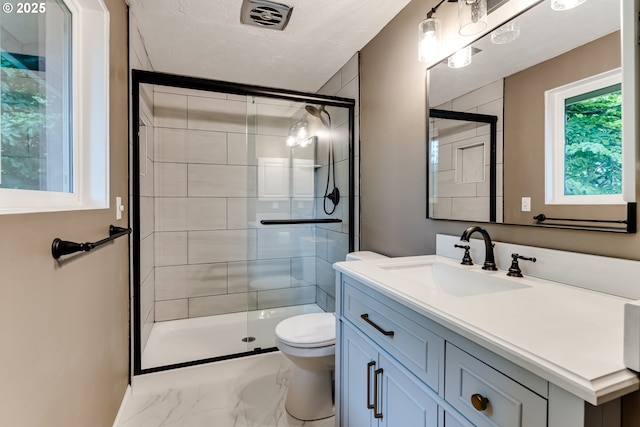 5120 Talisman St, Eugene, OR 97405 - bathroom featuring vanity, a stall shower, and marble finish floors