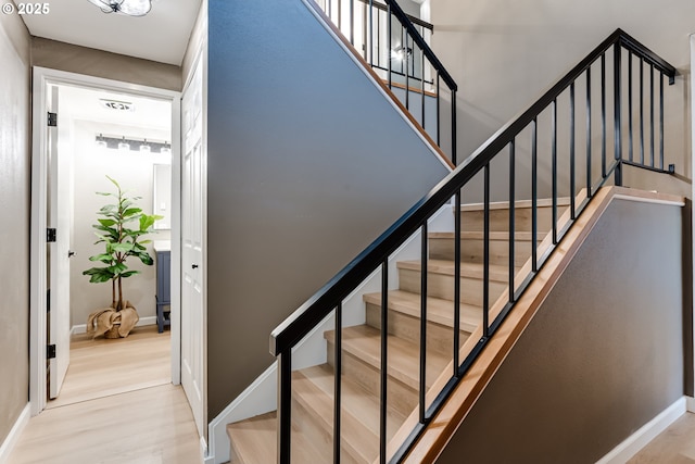 5120 Talisman St, Eugene, OR 97405 - stairway with baseboards and wood finished floors
