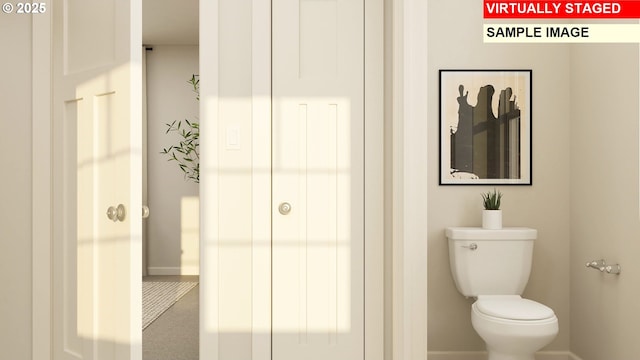 12198 SW Champlin Ln, Beaverton, OR 97007 - bathroom featuring baseboards and toilet
