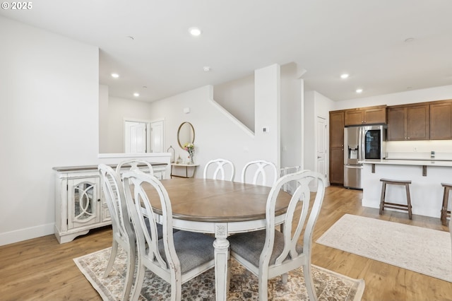 dining room featuring light hardwood / wood-style floors