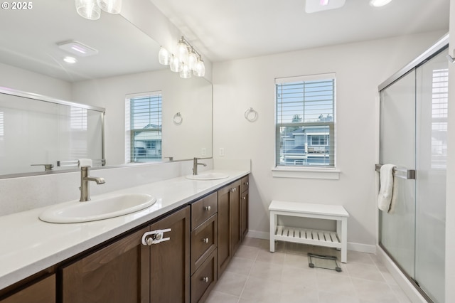 bathroom featuring vanity, tile patterned floors, and an enclosed shower