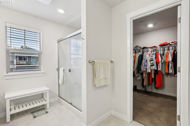 bathroom featuring an enclosed shower