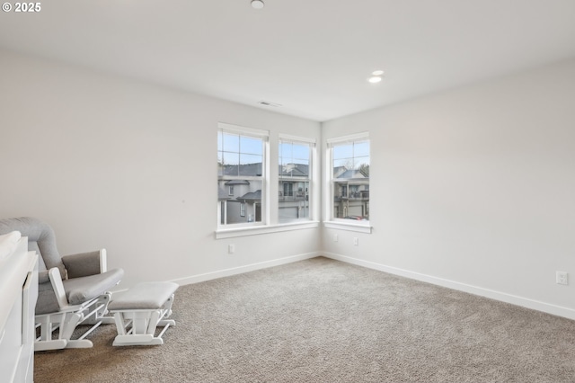 unfurnished room with carpet flooring