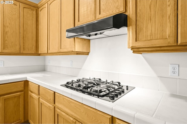 5274 NW Crady Ln, Portland, OR 97229 - kitchen featuring under cabinet range hood, black gas stovetop, and tile counters