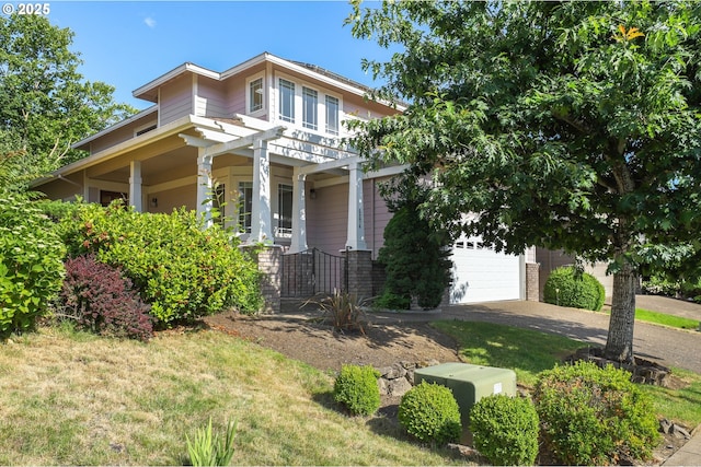 5274 NW Crady Ln, Portland, OR 97229 - view of front of property featuring driveway, a garage, brick siding, and a front yard