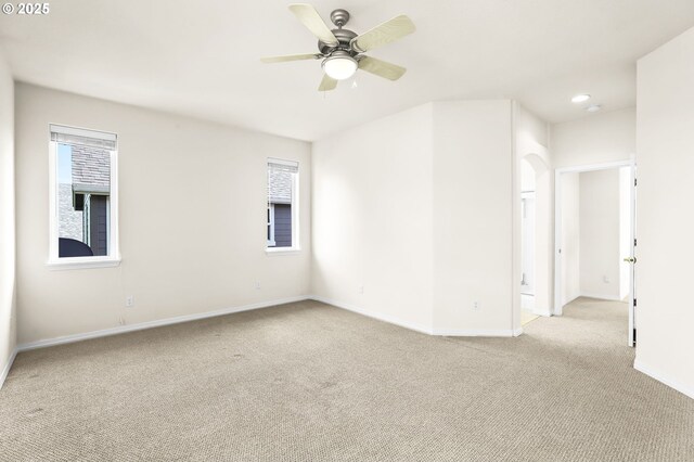 5274 NW Crady Ln, Portland, OR 97229 - spare room with light carpet, a ceiling fan, plenty of natural light, and recessed lighting