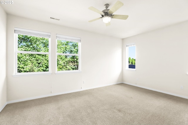 5274 NW Crady Ln, Portland, OR 97229 - spare room featuring carpet and a ceiling fan