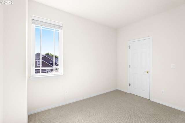 5274 NW Crady Ln, Portland, OR 97229 - unfurnished room with light colored carpet and baseboards