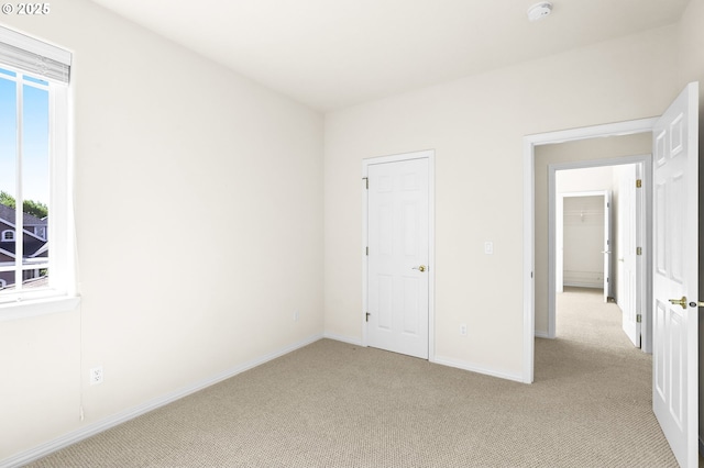 5274 NW Crady Ln, Portland, OR 97229 - unfurnished bedroom featuring light carpet