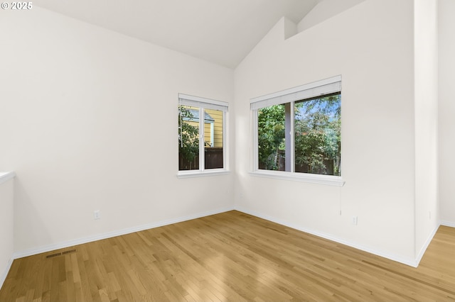 5274 NW Crady Ln, Portland, OR 97229 - unfurnished room with light wood-style floors and high vaulted ceiling
