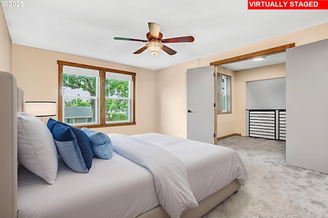 3017 SE Brookwood Ave, Hillsboro, OR 97123 - carpeted bedroom with baseboards and a ceiling fan