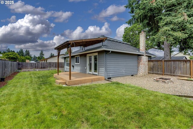 3017 SE Brookwood Ave, Hillsboro, OR 97123 - back of property with a patio area, a chimney, and french doors