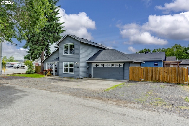 3017 SE Brookwood Ave, Hillsboro, OR 97123 - view of front facade featuring an attached garage, asphalt driveway, and roof with shingles