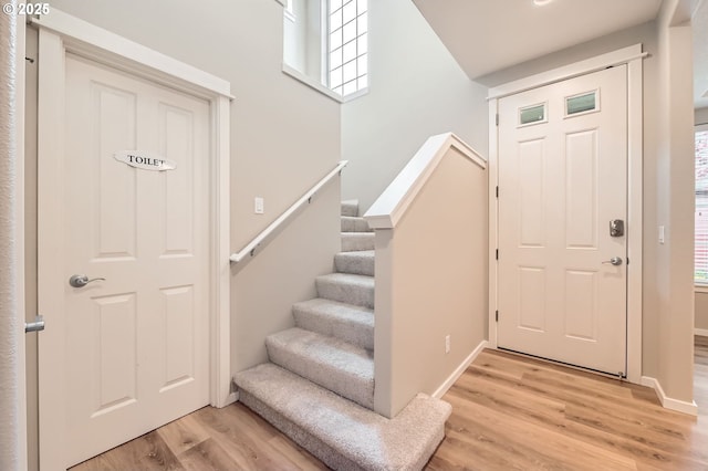 799 NE 70th Ave, Hillsboro, OR 97124 - entrance foyer featuring light wood-type flooring, stairway, and plenty of natural light