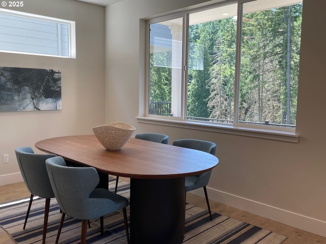 7839 SW Thornbridge Ter Unit 10, Beaverton, OR 97007 - dining space with baseboards and wood finished floors
