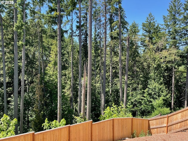 7839 SW Thornbridge Ter Unit 10, Beaverton, OR 97007 - view of yard featuring a wooded view