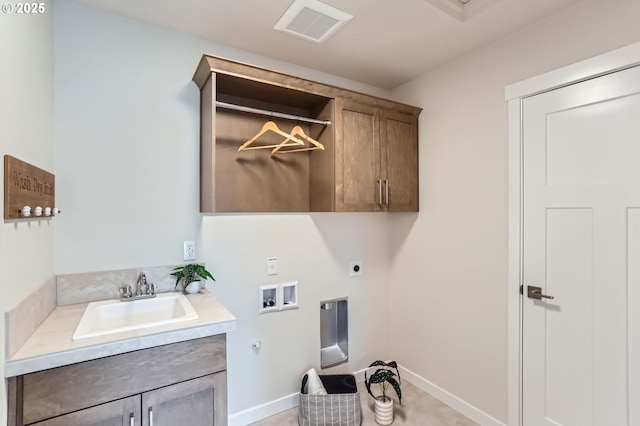 7839 SW Thornbridge Ter Unit 10, Beaverton, OR 97007 - laundry area featuring cabinet space, hookup for an electric dryer, hookup for a washing machine, and baseboards