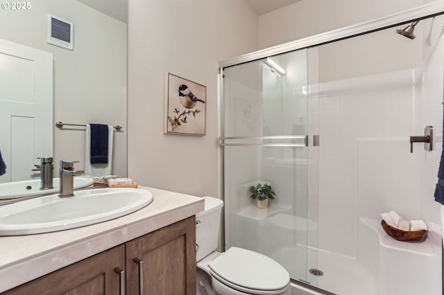 7839 SW Thornbridge Ter Unit 10, Beaverton, OR 97007 - bathroom with toilet, a stall shower, and vanity