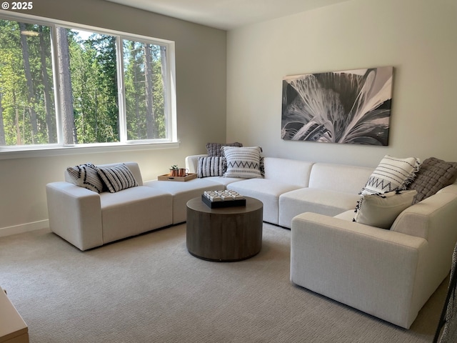 7839 SW Thornbridge Ter Unit 10, Beaverton, OR 97007 - carpeted living room featuring baseboards
