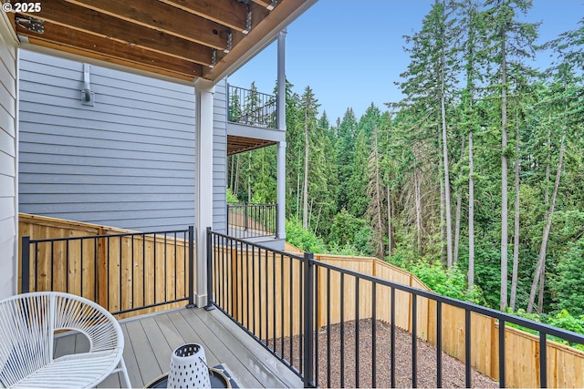 7839 SW Thornbridge Ter Unit 10, Beaverton, OR 97007 - wooden deck featuring a wooded view and a fenced backyard