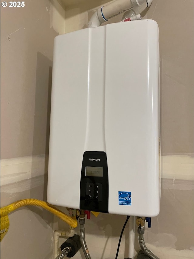 7839 SW Thornbridge Ter Unit 10, Beaverton, OR 97007 - utility room with tankless water heater