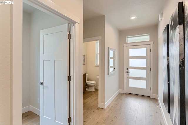 7839 SW Thornbridge Ter Unit 10, Beaverton, OR 97007 - foyer with baseboards, light wood-style floors, and recessed lighting