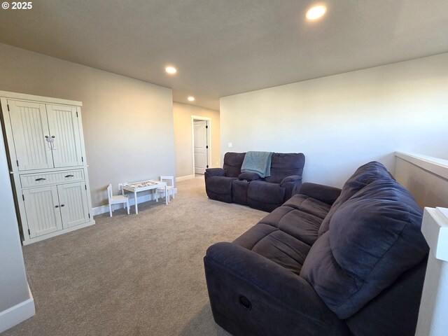 living room featuring light carpet