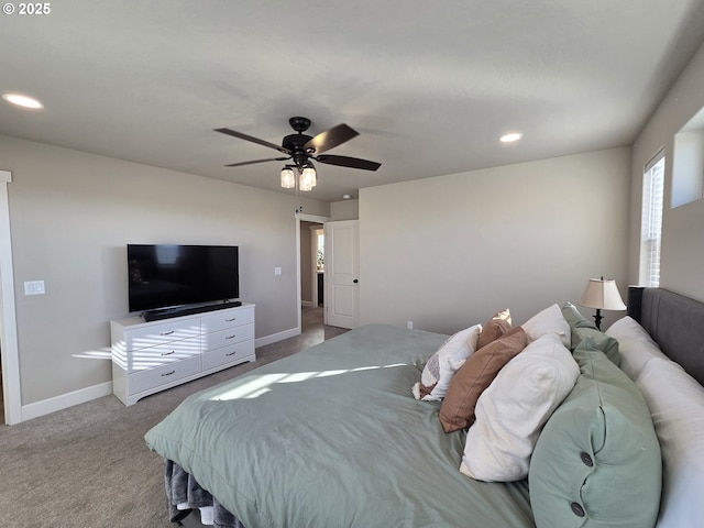 carpeted bedroom with ceiling fan