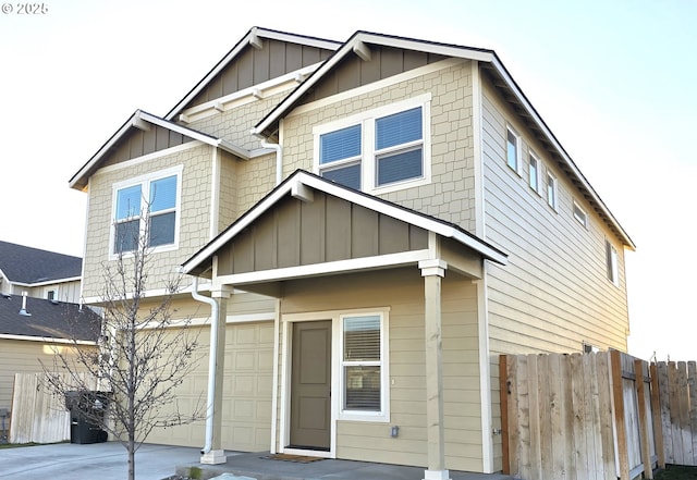 craftsman-style home with a garage