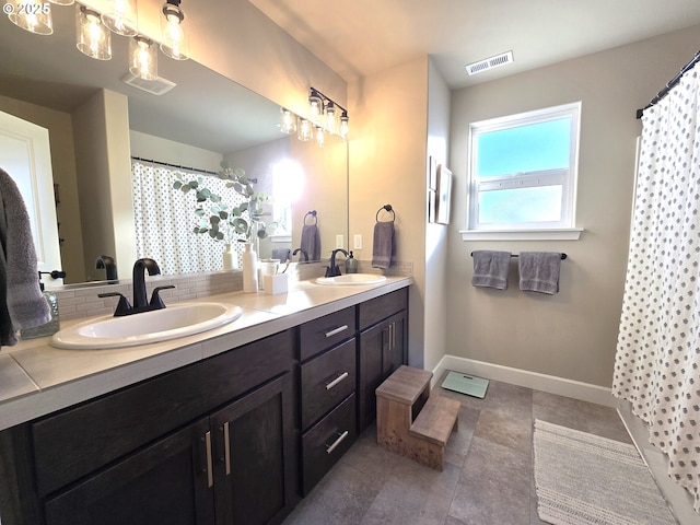 bathroom featuring vanity and tile patterned floors