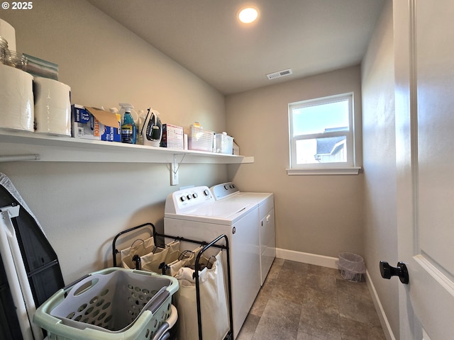 laundry area featuring washing machine and dryer