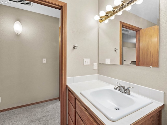 bathroom featuring visible vents and vanity