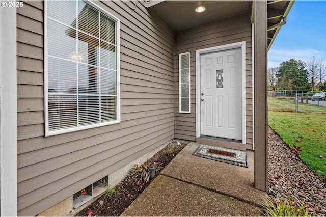 property entrance featuring fence