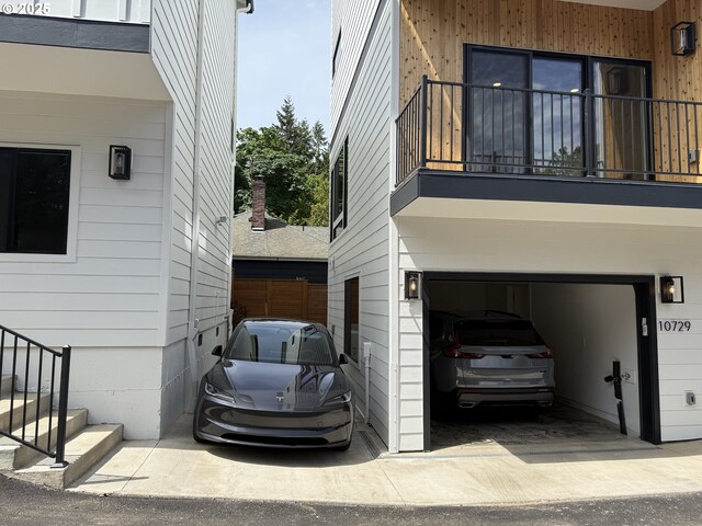 10729 NE Fremont St, Portland, OR 97220 - view of side of home featuring an attached garage