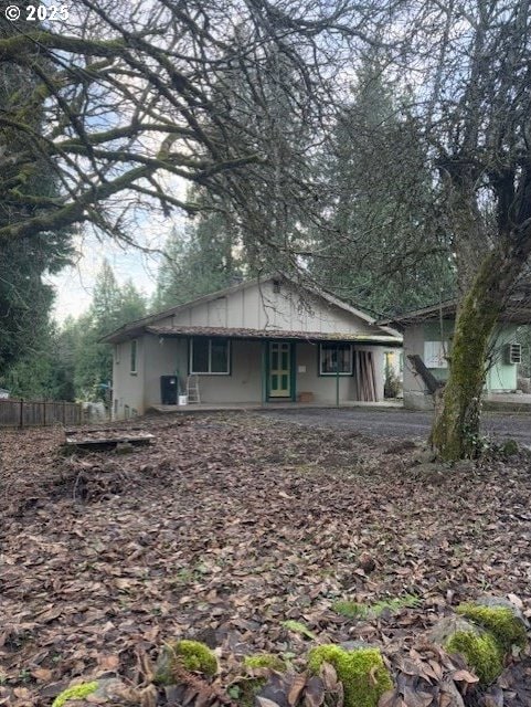 back of house with a patio area