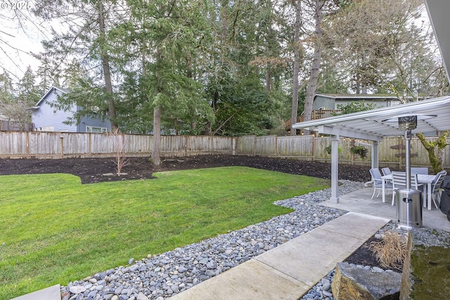 view of yard with a patio and a pergola