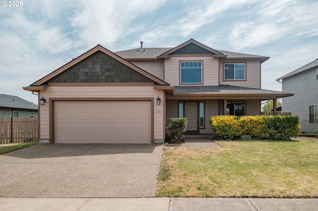 1989 S 12th St, Lebanon, OR 97355 - view of front of property featuring driveway, an attached garage, and covered porch