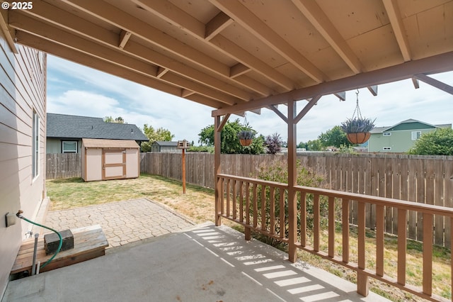 1989 S 12th St, Lebanon, OR 97355 - fenced backyard featuring a patio and a shed