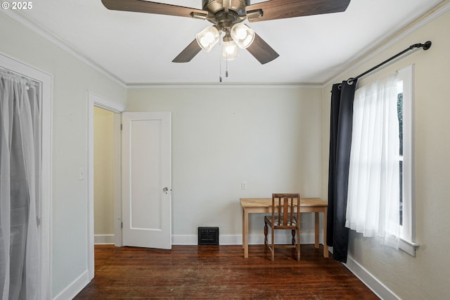 unfurnished office with dark wood-type flooring, visible vents, crown molding, and baseboards