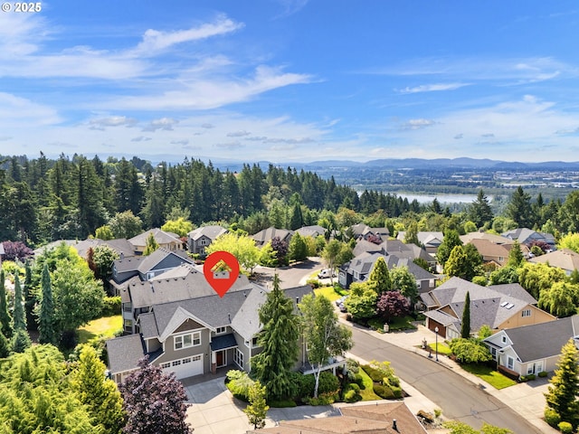1046 NW Deerfern Loop, Camas, WA 98607 - aerial view of residential area with a water and mountain view and a heavily wooded area