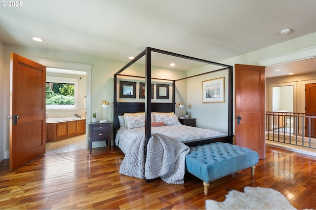1046 NW Deerfern Loop, Camas, WA 98607 - bedroom featuring wood finished floors and recessed lighting