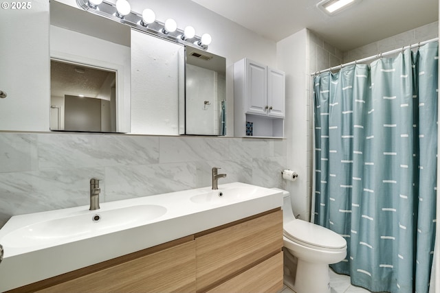 bathroom featuring tile walls, decorative backsplash, vanity, walk in shower, and toilet