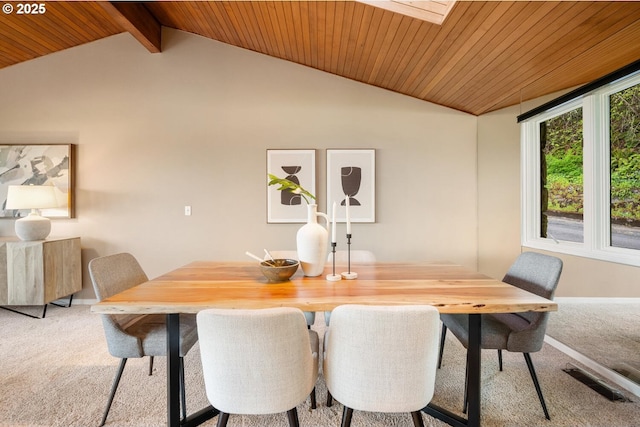 3110 NW Monte Vista Ter, Portland, OR 97210 - dining space with visible vents, light colored carpet, wood ceiling, and lofted ceiling