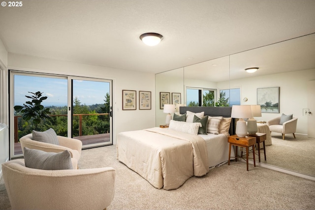 3110 NW Monte Vista Ter, Portland, OR 97210 - bedroom featuring light carpet and access to exterior