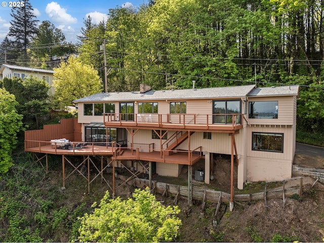 3110 NW Monte Vista Ter, Portland, OR 97210 - back of house with stairway, fence, a wooden deck, and a chimney
